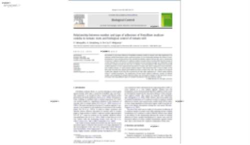 Relationship between number and type of adhesions of Penicillium oxalicum conidia to tomato roots and biological control of tomato wilt